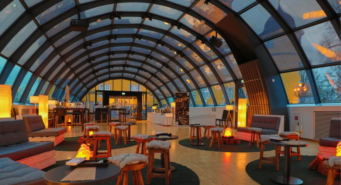 Light, design, and comfort come together in this stylish meeting space for your guests.