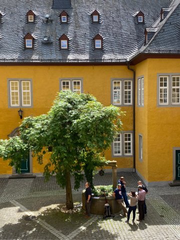 Exterior view of Hotel Schloss Montabaur with castle grounds, green parkland and historical flair