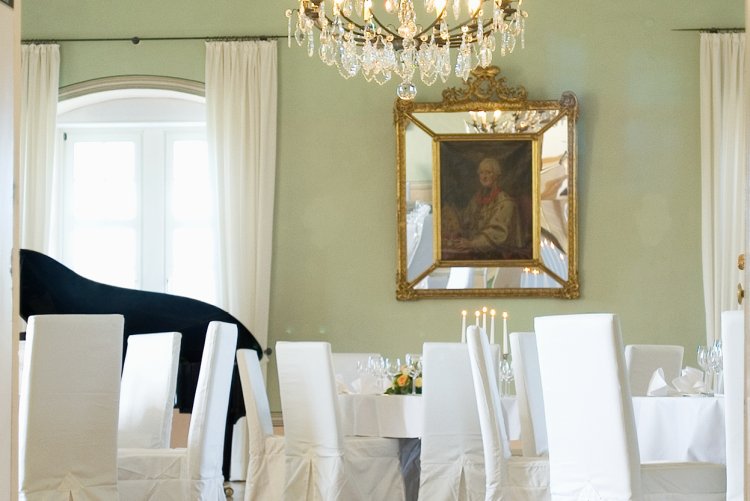Magnificent Knights' Hall at Hotel Schloss Montabaur with elaborate ceiling paintings, banquet seating and a festive ambience for up to 72 guests