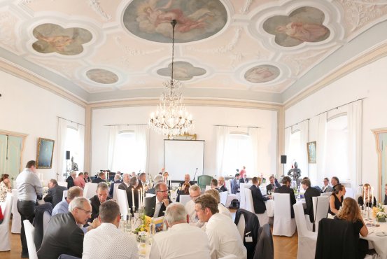 Magnificent Knights' Hall at Hotel Schloss Montabaur with elaborate ceiling paintings, banquet seating and a festive ambience for up to 72 guests