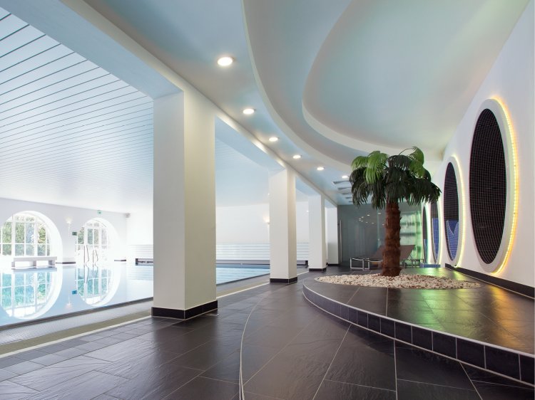 Modern spa area at Hotel Schloss Montabaur with stylish loungers and a calming atmosphere.