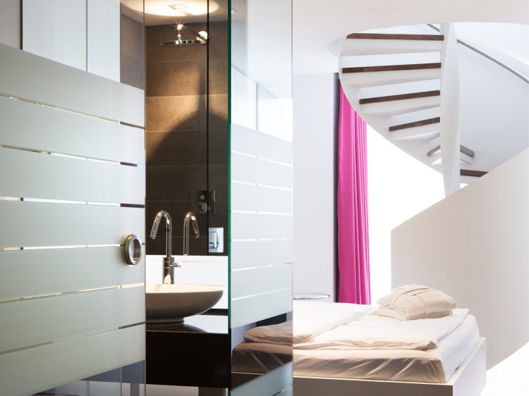 Comfort room at Hotel Schloss Montabaur with double bed, desk and modern bathroom