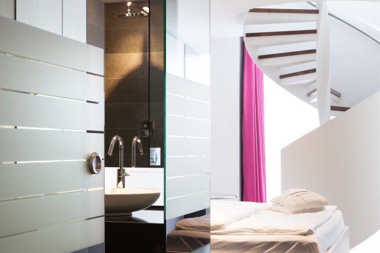 Comfort room at Hotel Schloss Montabaur with double bed, desk and modern bathroom